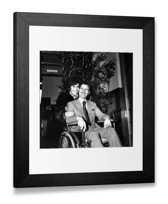 Framed Print : Racing driver Graham Hill left University College Hospital, in a wheelchair Framed Print : Racing driver Graham Hill left University College Hospital, in a wheelchair