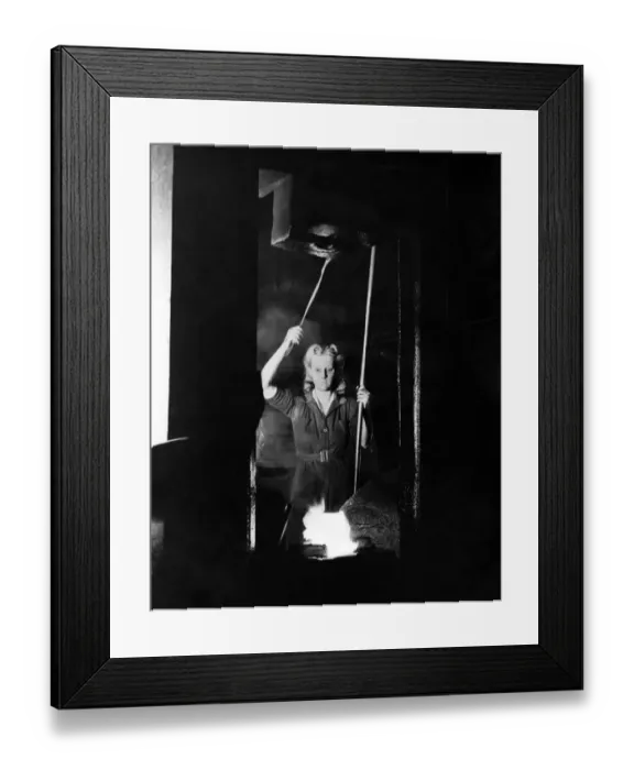 Framed Print : World War II Women. A woman operating a power hammer at the L. N. E. R. loco works