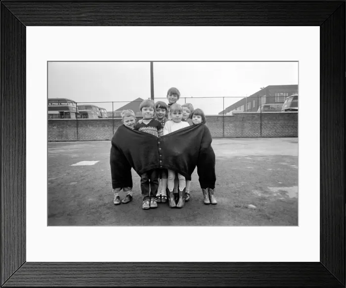 Framed Print : The seven children in the fat mans pullover are (left to right Framed Print : The seven children in the fat mans pullover are (left to right