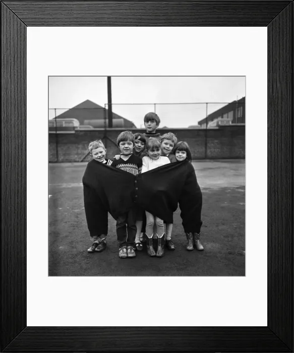 Framed Print : The seven children in the fat mans pullover are (left to right Framed Print : The seven children in the fat mans pullover are (left to right