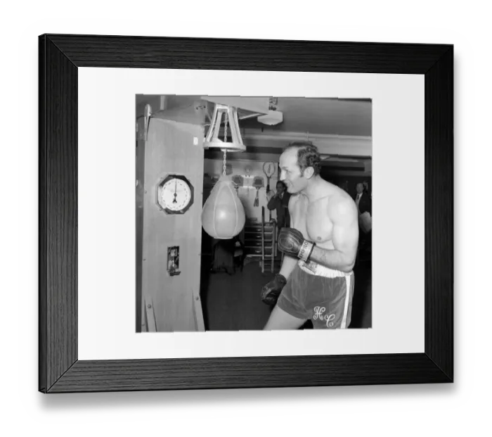 Framed Print : Someone will be on the receiving end from a Henry Cooper punch, and like it