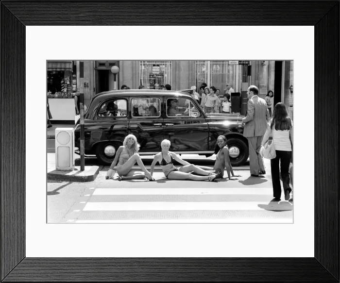Framed Print : Traffic came to a Standstill in Knightsbridge today when three London models wearing Framed Print : Traffic came to a Standstill in Knightsbridge today when three London models wearing