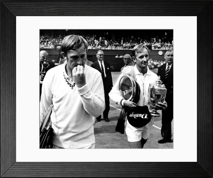Framed Print : Rod Laver wins Wimbledon mens singles final 1968 leavesd the court with his opponent Tony