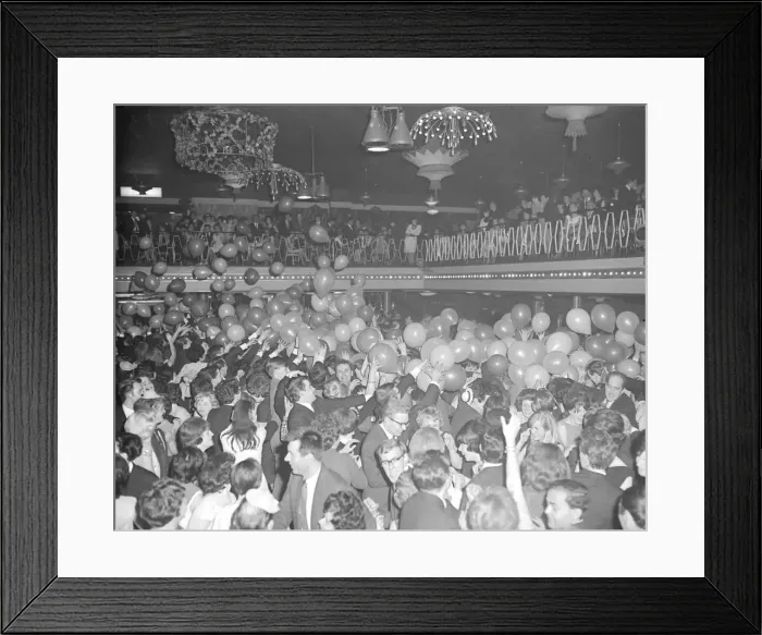 Framed Print : Midnight strikes and 500 balloons cascade on to the dancefloor at the Locarno, Coventry