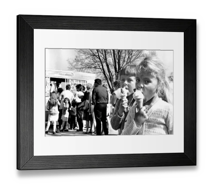Framed Print : A young boy and girl enjoy their ice creams at Wyken Slough pool, Coventry