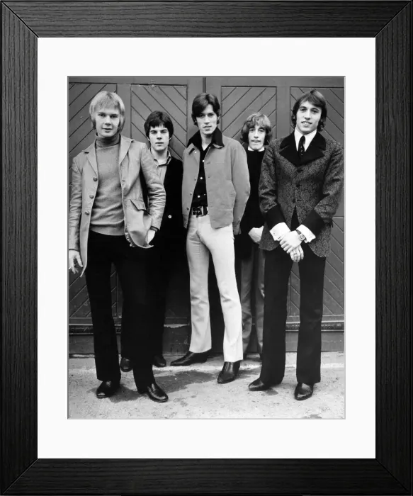 Framed Print : The Bee Gees pop group pose Left to right: drummer Colin Peterson