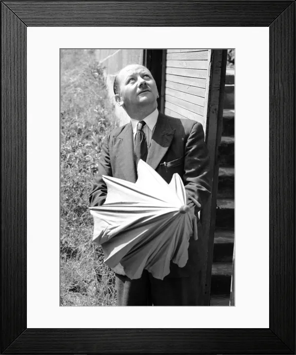 Framed Print : Mr W Davis of Priory Hill Dartford, Kent is doubtful about the weather. 10th August 1953 Framed Print : Mr W Davis of Priory Hill Dartford, Kent is doubtful about the weather. 10th August 1953