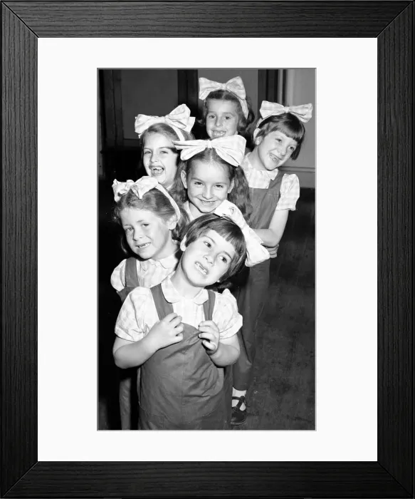 Framed Print : Six little dancing girls smile to camera and reveal that they have all lost their front