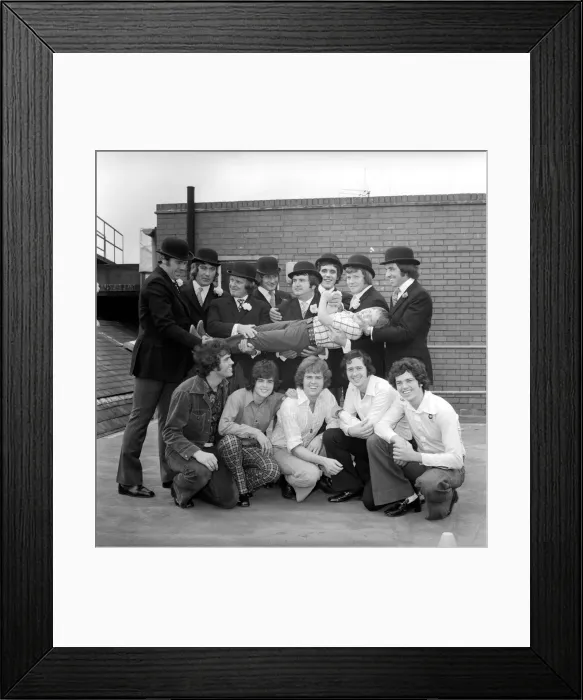 Framed Print : The Osmond Brothers pop group pose with body guards dressed as city gents with bowler Framed Print : The Osmond Brothers pop group pose with body guards dressed as city gents with bowler
