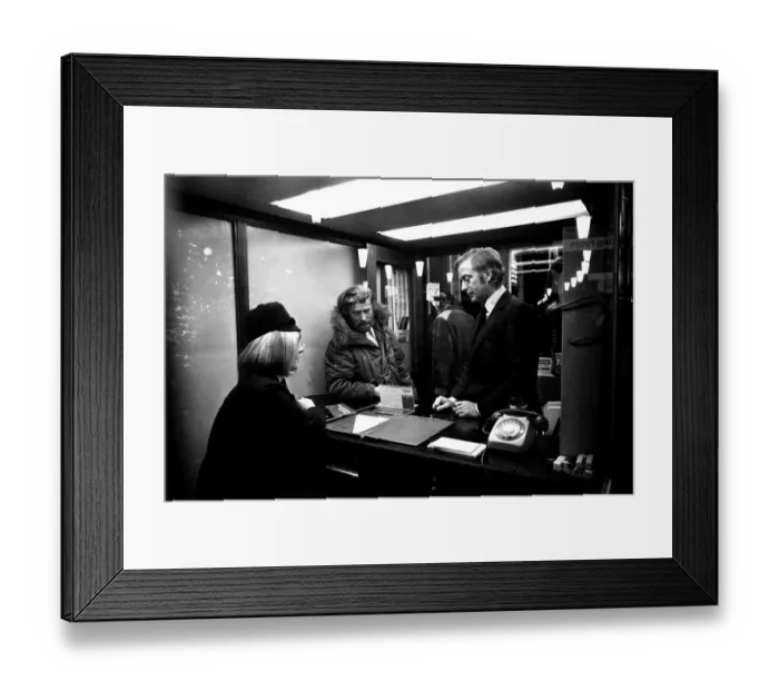 Framed Print : Film legend Michael Caine in Godrey Davies car hire office in Newcastle Central Station