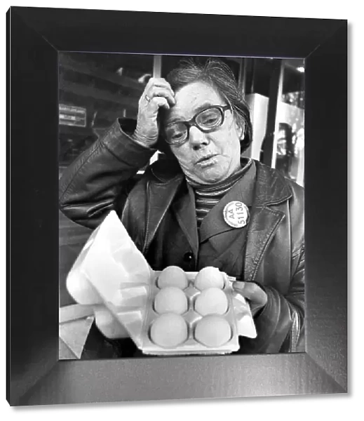 Bus conductress Mrs. Rose Whittaker sums up shoppers feelings aver the scrambled egg code