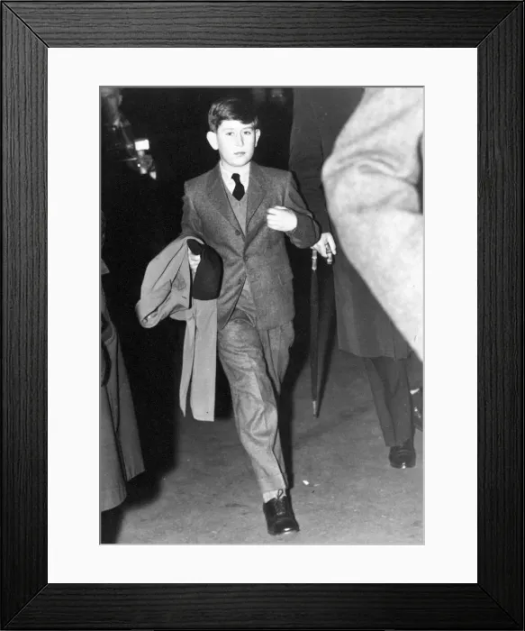 Framed Print : Prince Charles - The Prince of Wales wearing long trousers is seen walking down Framed Print : Prince Charles - The Prince of Wales wearing long trousers is seen walking down