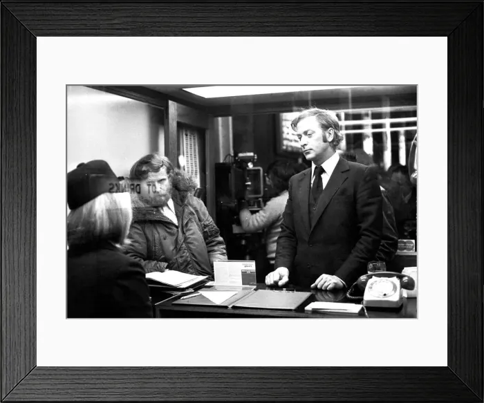 Framed Print : Film legend Michael Caine in Godrey Davies car hire office in Newcastle Central Station Framed Print : Film legend Michael Caine in Godrey Davies car hire office in Newcastle Central Station