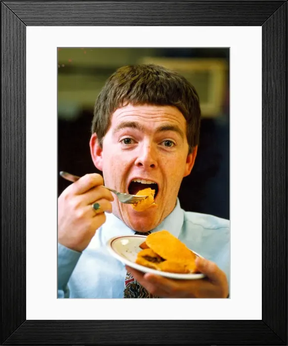 Framed Print : A man eating crispy pancakes in 1994 Framed Print : A man eating crispy pancakes in 1994