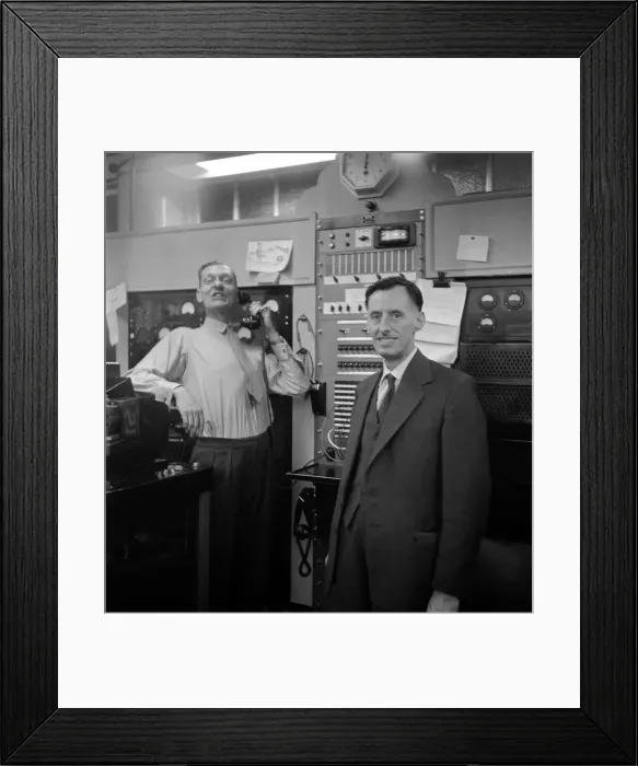 Framed Print : Bernard Coster, Daily Mirror Telephoto Room technician, seen here at work