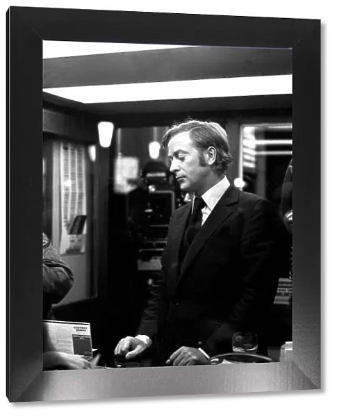Film legend Michael Caine in Godrey Davies car hire office in Newcastle Central Station