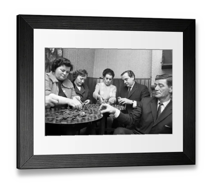 Framed Print : Cubbington personality girl Miss Susan Rogers pushed over a pile of pennies built