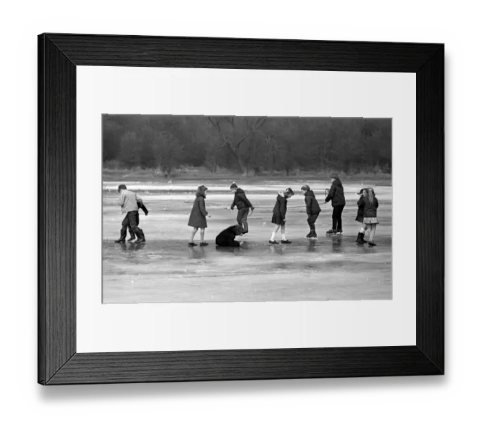 Framed Print : Children enjoy skating on the ice at Welchs Meadow, Leamington Framed Print : Children enjoy skating on the ice at Welchs Meadow, Leamington