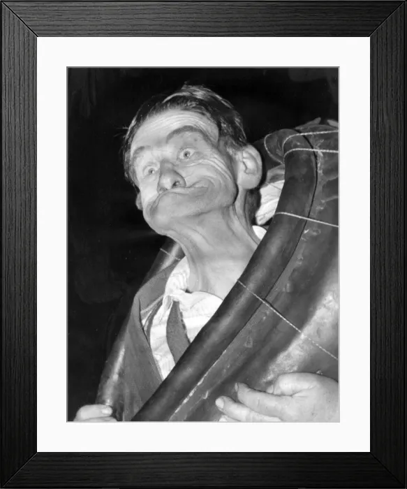 Framed Print : Mr Bennison demonstrates the winning twist - gurning. 18th September 1965