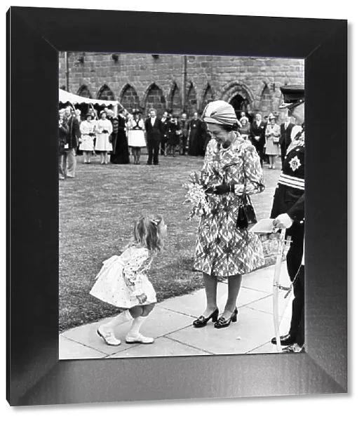 Queen Elizabeth II, visiting Hexham Abbey, is greeted by Heather Jackson