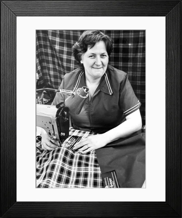 Framed Print : Mrs. Marjorie Landles a the J Barbour factory making the all weather Game Fare breeches