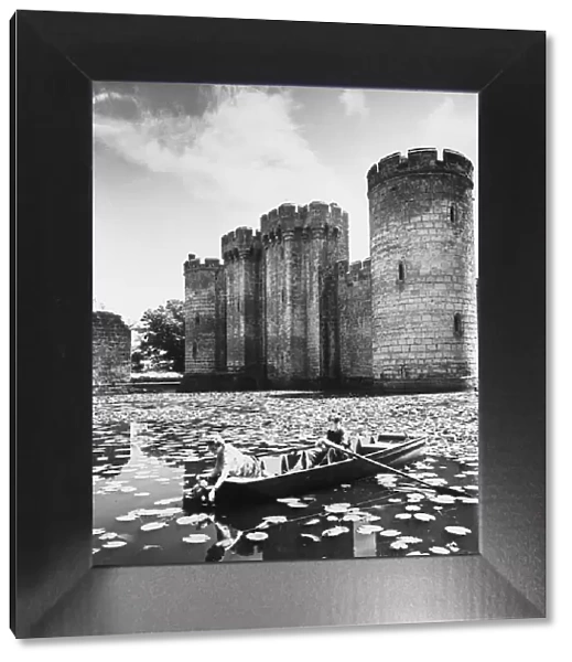 Water lillies in the moat surrounding Bodiam Castle. Circa 1945