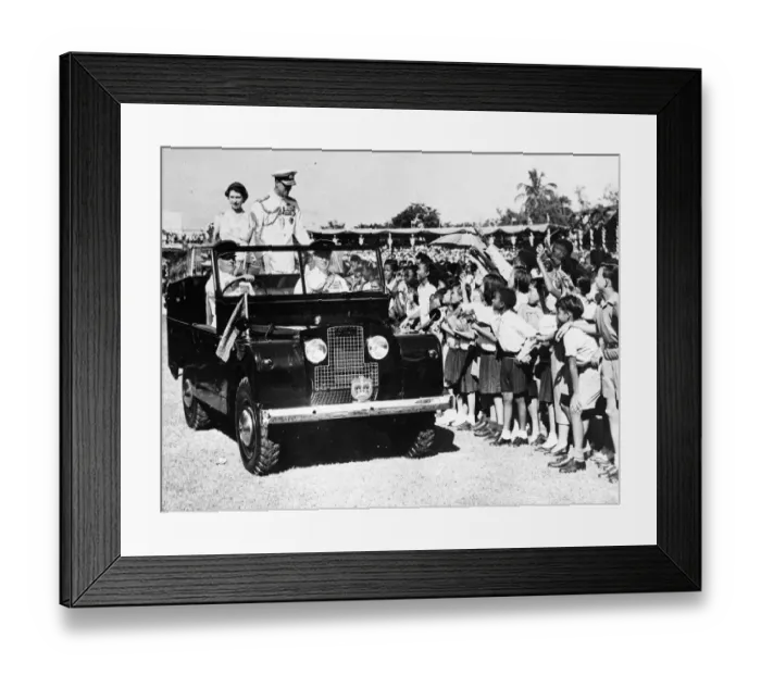 Framed Print : Queen Elizabeth II and Prince Philip smile at waving schoolchildren during heir visit to Framed Print : Queen Elizabeth II and Prince Philip smile at waving schoolchildren during heir visit to