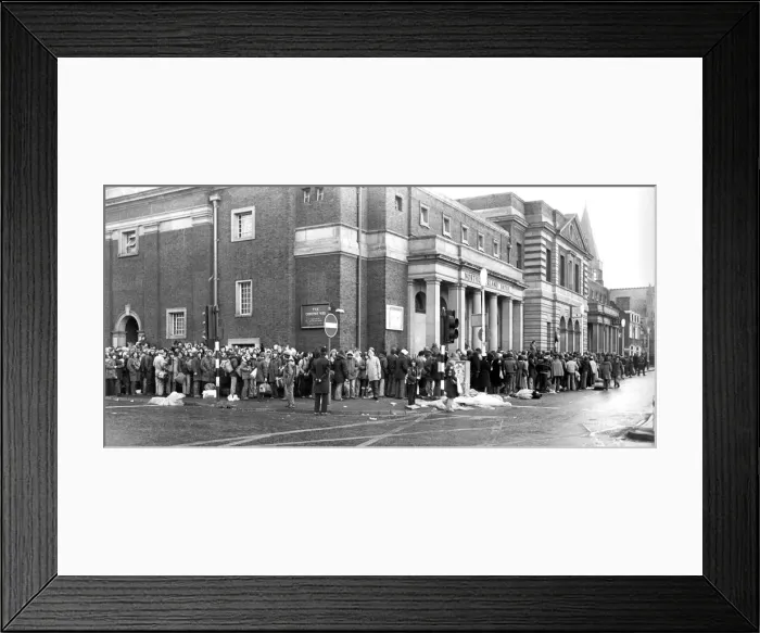 Framed Print : Fans of Genesis queueing up outside Newcastle City Hall for tickets