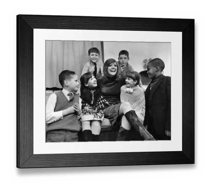 Framed Print : Underpriviledged children at the Palladium. Singer Cilla Black wth six of the children Framed Print : Underpriviledged children at the Palladium. Singer Cilla Black wth six of the children
