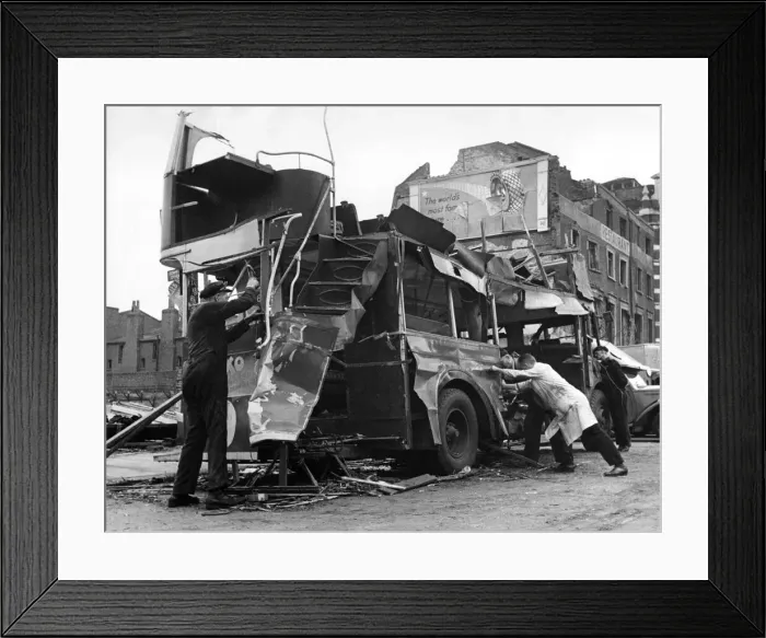Framed Print : Bomb damage near Waterloo Station. A Blitzed bus caused by blast from a V1 flying bomb