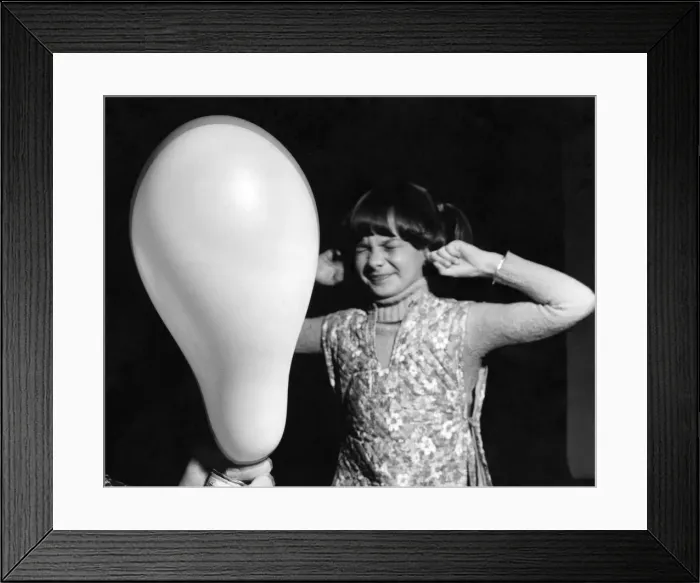 Framed Print : Little Tamara Hallett grits her teeth for the moment that every child dreads Framed Print : Little Tamara Hallett grits her teeth for the moment that every child dreads