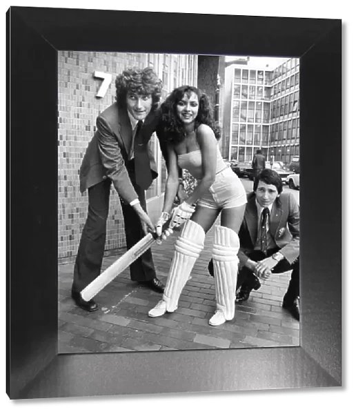 Bob Willis, model girl Penny Barnett in cricket outfit, and Wicket Keeper Derek Randall