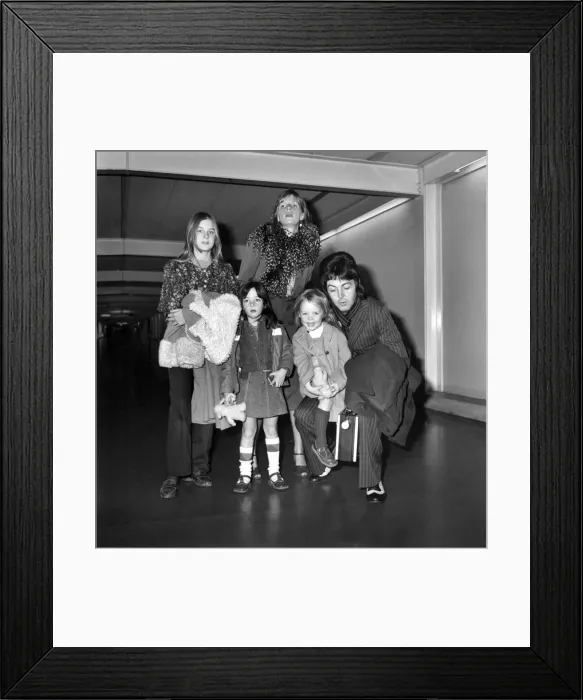 Framed Print : Pop star Paul McCartney and family. Carrying a portable radio Framed Print : Pop star Paul McCartney and family. Carrying a portable radio