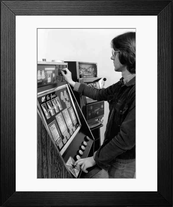 Framed Print : Fruit machines / Arcades / Amusements / Gambling. January 1975 75-00158 Framed Print : Fruit machines / Arcades / Amusements / Gambling. January 1975 75-00158