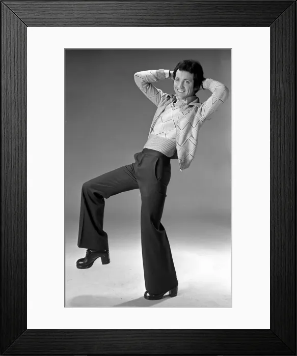 Framed Print : Paul Jaegar seen here modeling the latest mens wear fashions for 1973 Rev Framed Print : Paul Jaegar seen here modeling the latest mens wear fashions for 1973 Rev