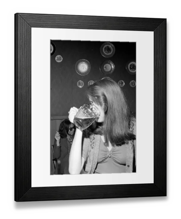 Framed Print : A girls night out One of four friends enjoy a pint down the local pub Framed Print : A girls night out One of four friends enjoy a pint down the local pub