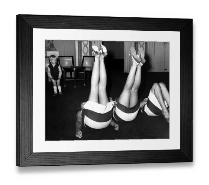 Framed Print : Clive Tulloch, aged three, watches his mother and her friends demonstrating a new leg Framed Print : Clive Tulloch, aged three, watches his mother and her friends demonstrating a new leg