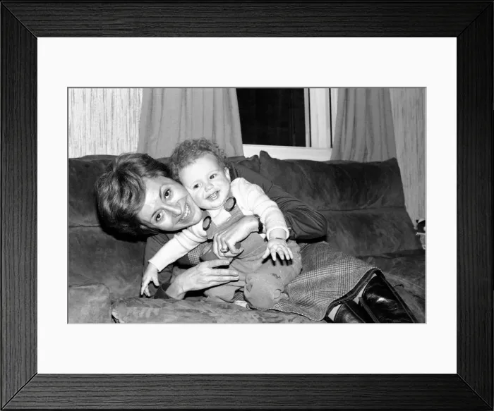 Framed Print : International singer star: Caterina Valente serenades her son. February 1975 75-00827-004
