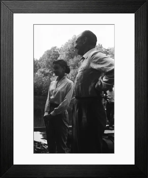 Framed Print : Gary Cooper and Audrey Hepburn making the film Love In the Afternoon 1956