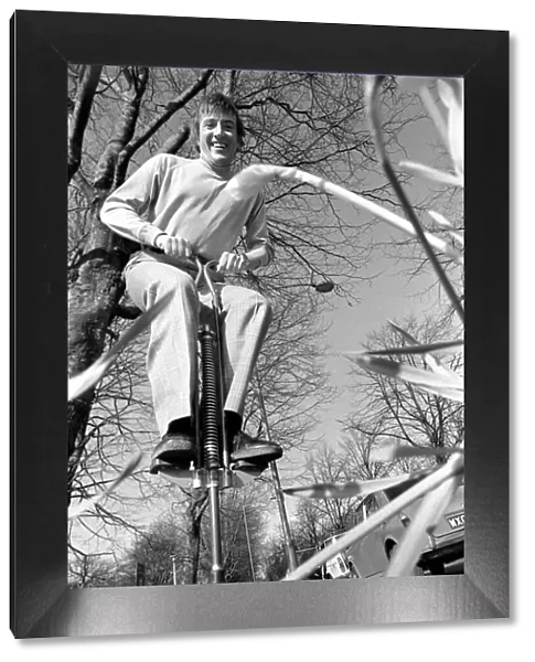 Roy Castle on a pogo stick. January 1975 75-00573