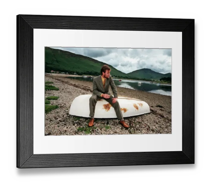 Framed Print : Ewan McGregor on the Isle of Arran July 1998 with bottle of Loch Ranza single malt whisky Framed Print : Ewan McGregor on the Isle of Arran July 1998 with bottle of Loch Ranza single malt whisky