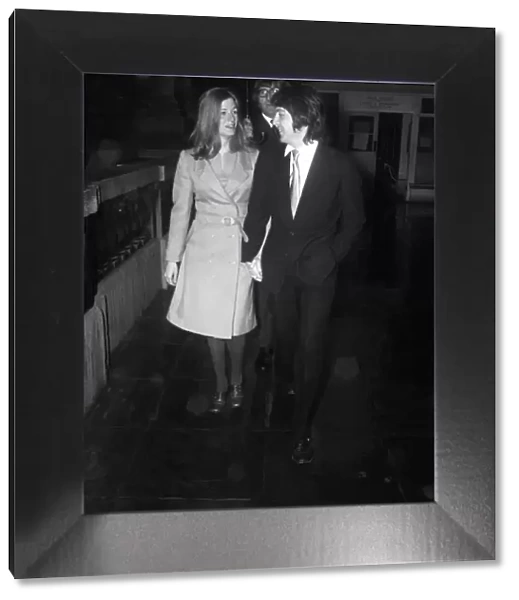 Beatle Paul, McCartney and his fiancee Linda Eastman arrives at a door of the register