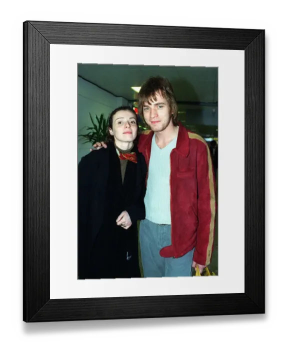 Framed Print : Actor Ewan McGregor and his wife Eve arrive at Glasgow Airport for the Film Festival