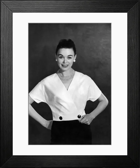 Framed Print : Reveille Fashions: Jackie Jackson modelling a wrap over blouse. October 1959 P006982 Framed Print : Reveille Fashions: Jackie Jackson modelling a wrap over blouse. October 1959 P006982