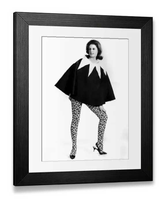 Framed Print : Clothing Fashion: Gloria James wearing a cape that can double up as a skirt