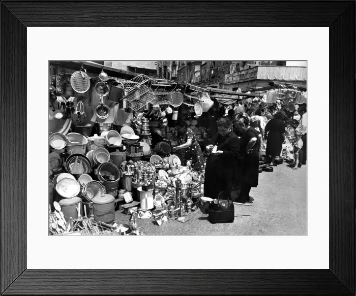 Framed Print : Pictured in Naples. A market scene in a suburb of Naples shows women buying kitchen ware Framed Print : Pictured in Naples. A market scene in a suburb of Naples shows women buying kitchen ware
