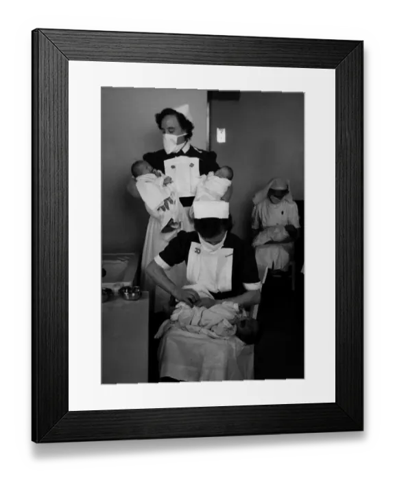 Framed Print : Hospital staff care for four new born babies shorlty after delivery Framed Print : Hospital staff care for four new born babies shorlty after delivery