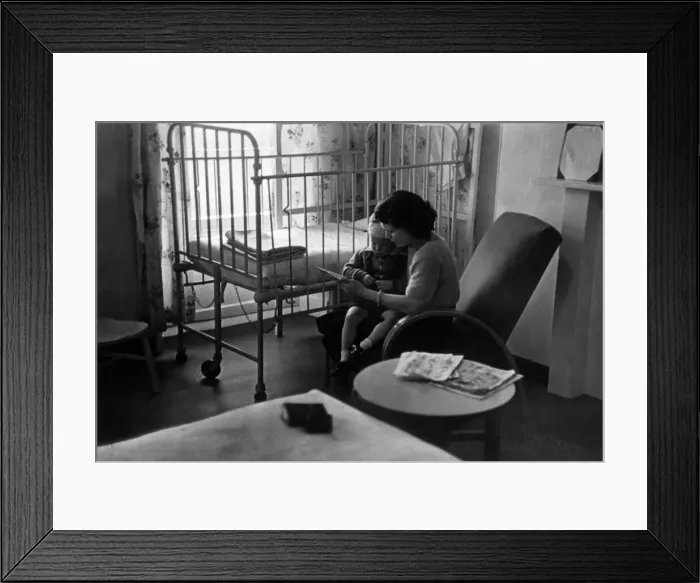 Framed Print : Young patient at a hospital after having an operation for gland trouble