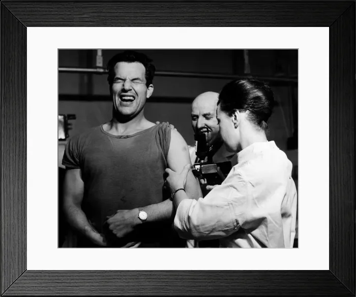 Framed Print : A patient receiving his anti flu injection at a Cardiff City doctor Framed Print : A patient receiving his anti flu injection at a Cardiff City doctor