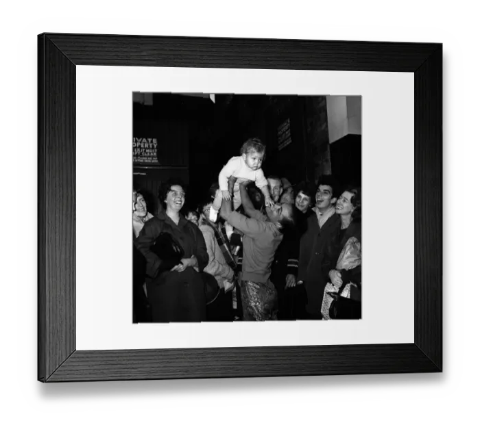 Framed Print : Eartha Kitt with her baby daughter Kitt meeting fans outside the stage door after a dress Framed Print : Eartha Kitt with her baby daughter Kitt meeting fans outside the stage door after a dress